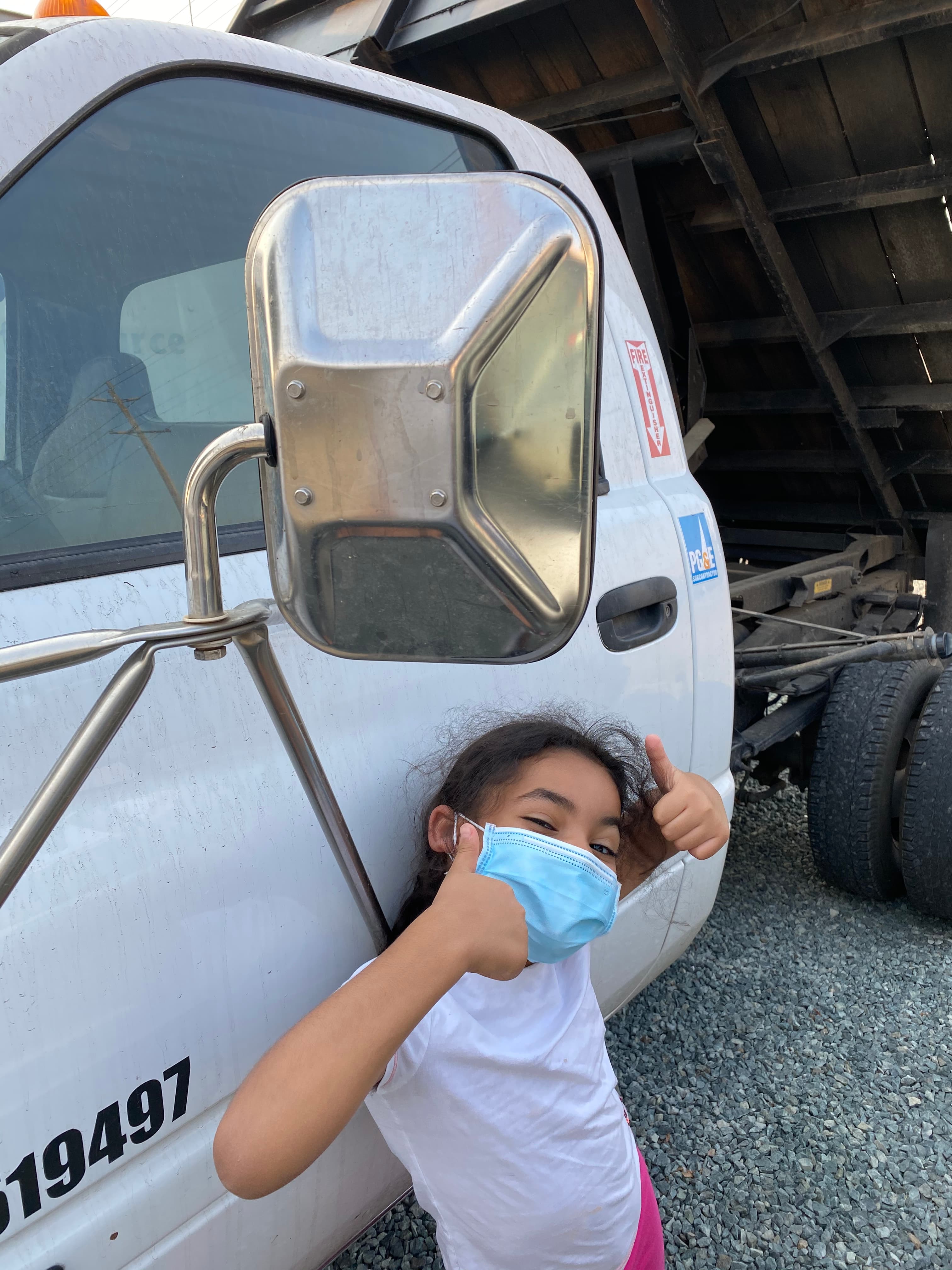 Chris with the first Servant King truck and his daughter — where it all started