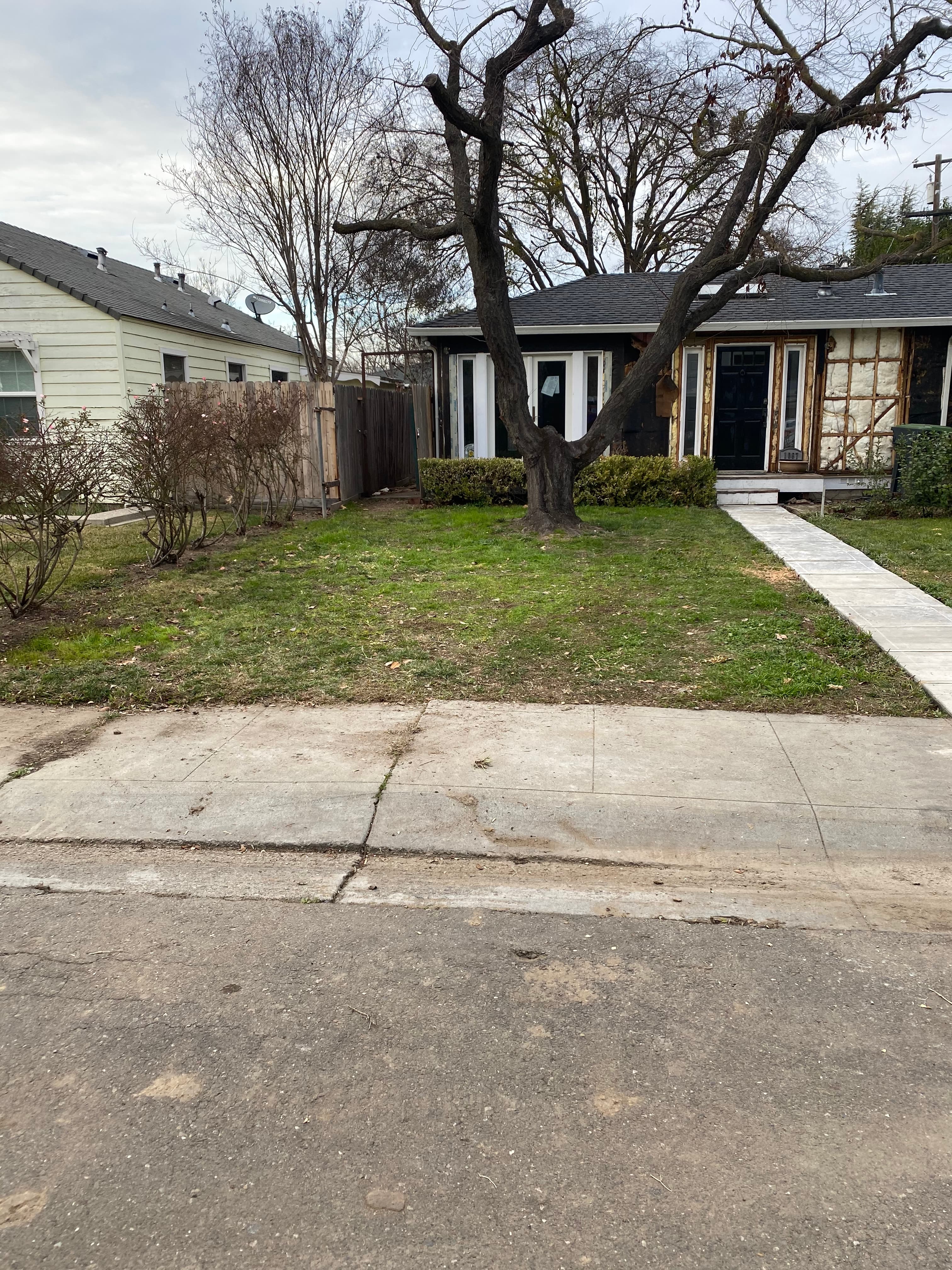 Cleared garage area after Servant King hauled the debris
