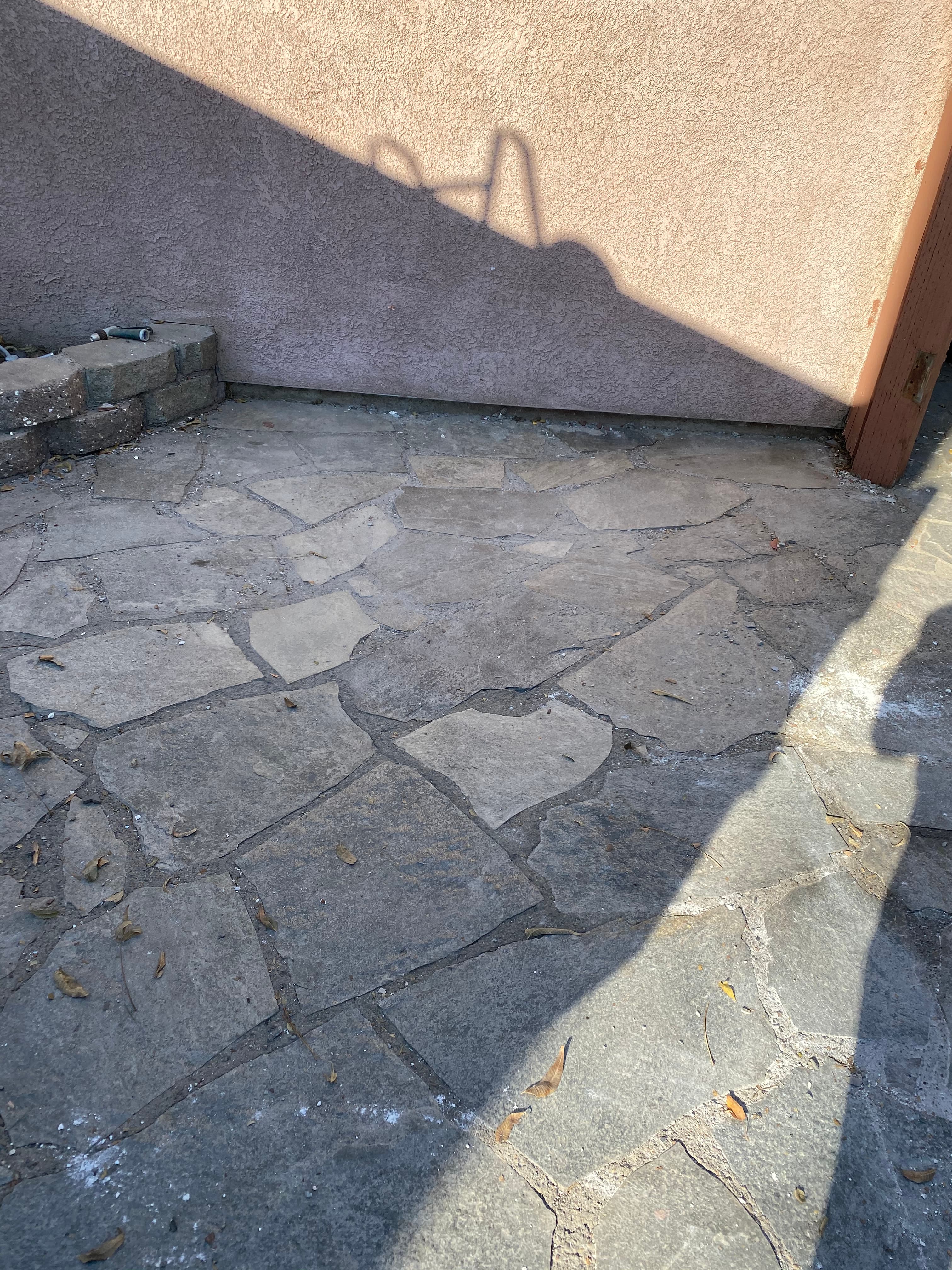 Bathroom with subfloor exposed after tile removal