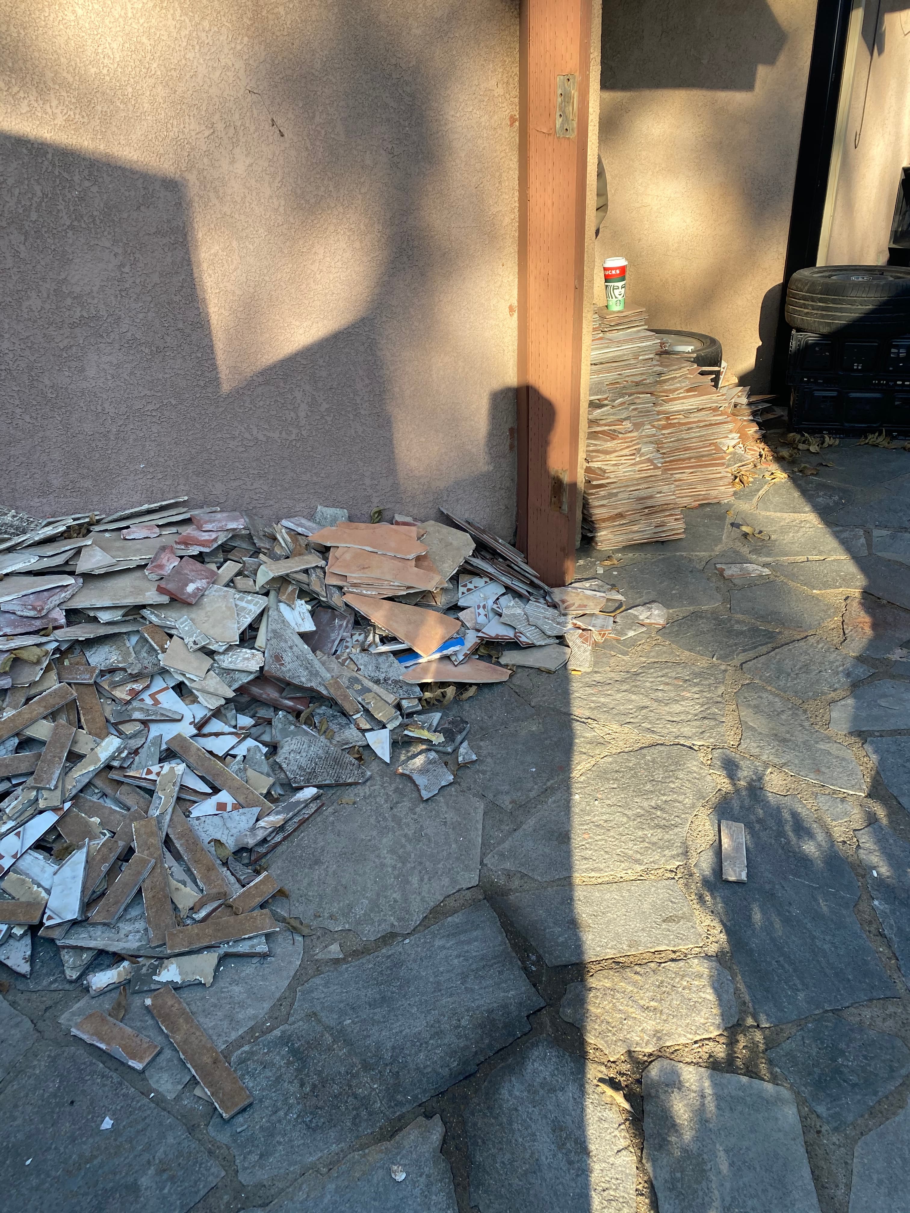 Bathroom with old tile floor before removal